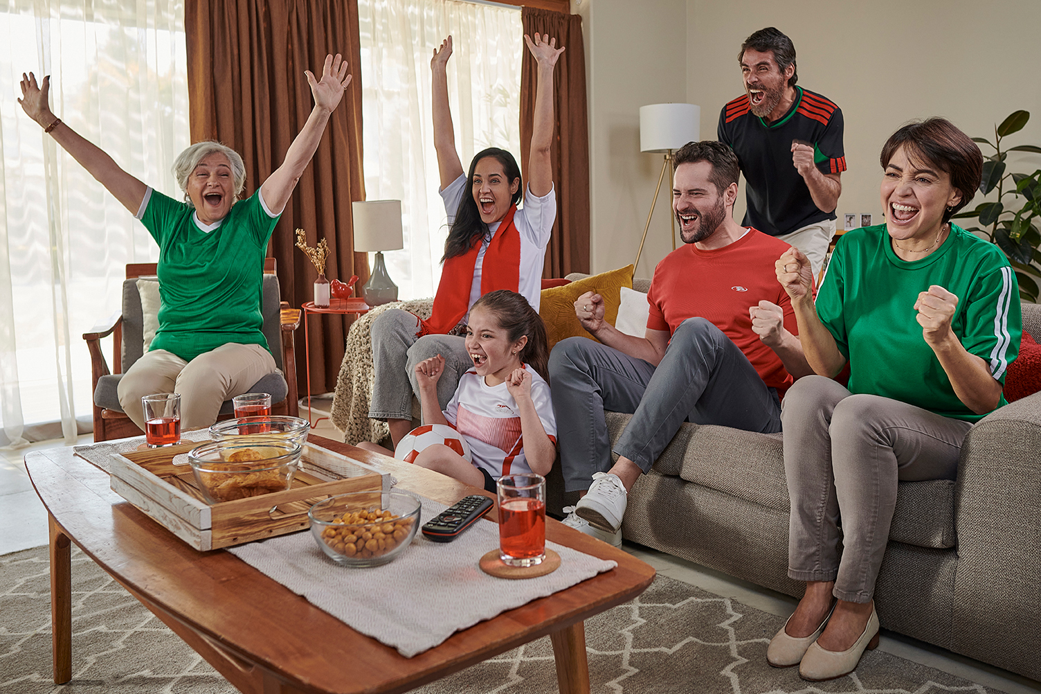 Family watching the big game