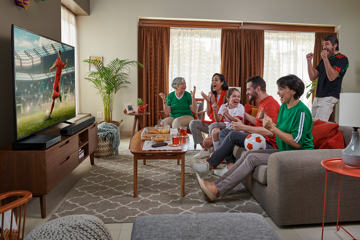 Hispanic Family Watching the Big Futbol Game