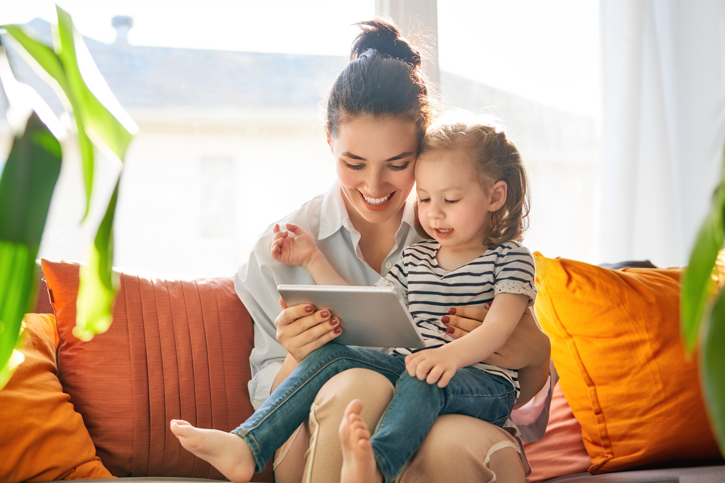 Mother and daughter enjoying the internet together