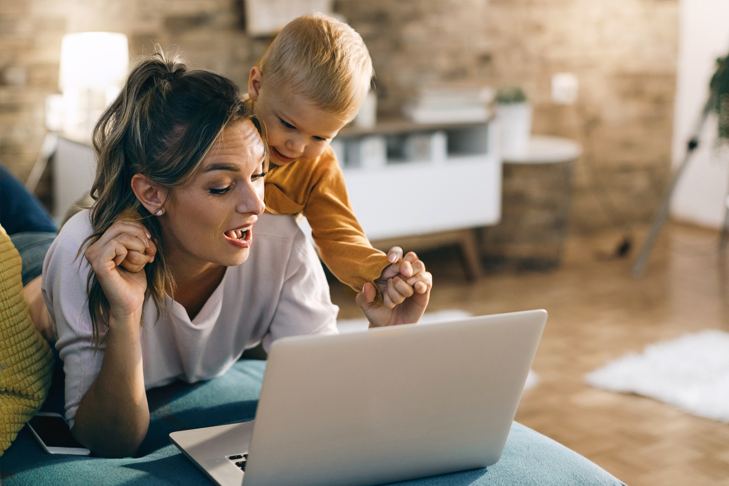 Mom and child with a laptop