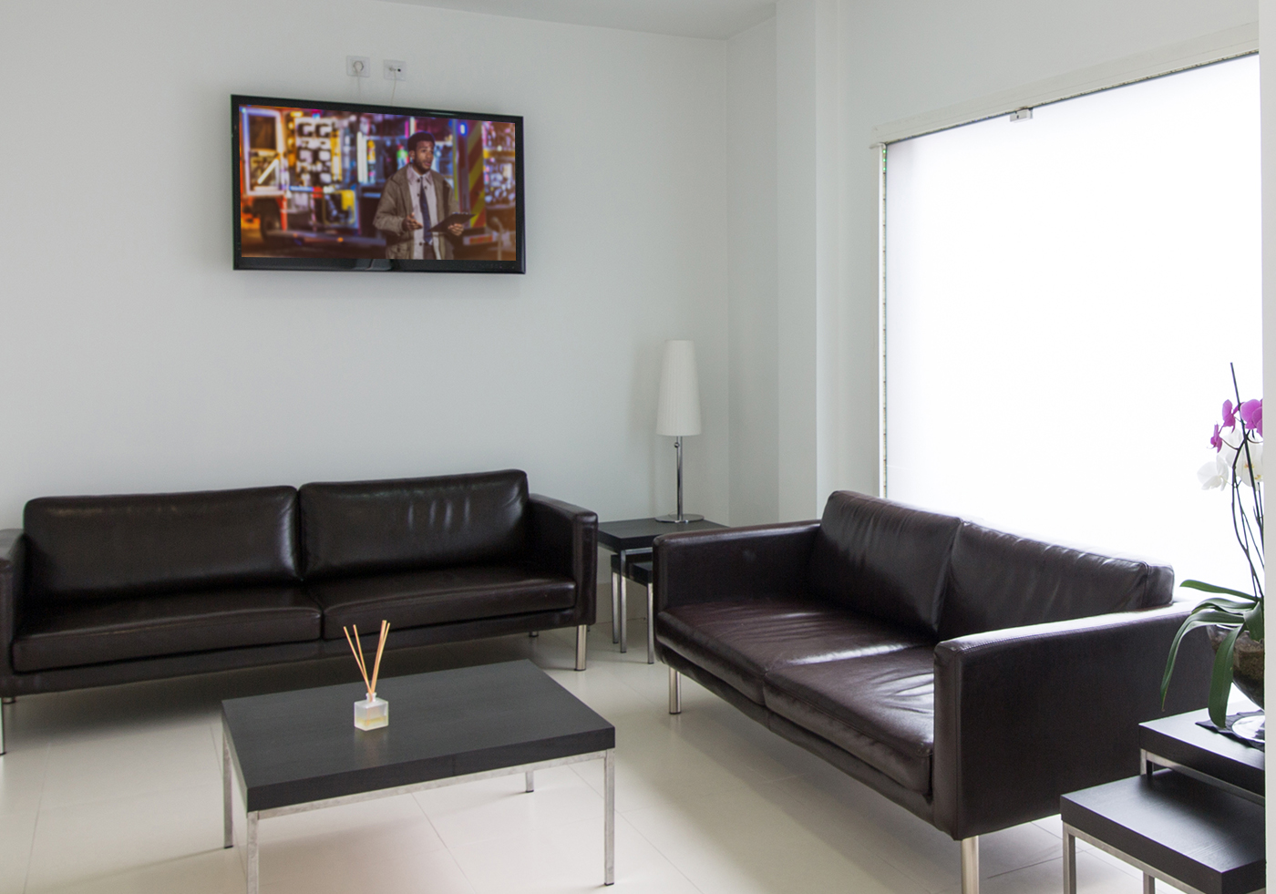 office waiting room with mounted tv on wall