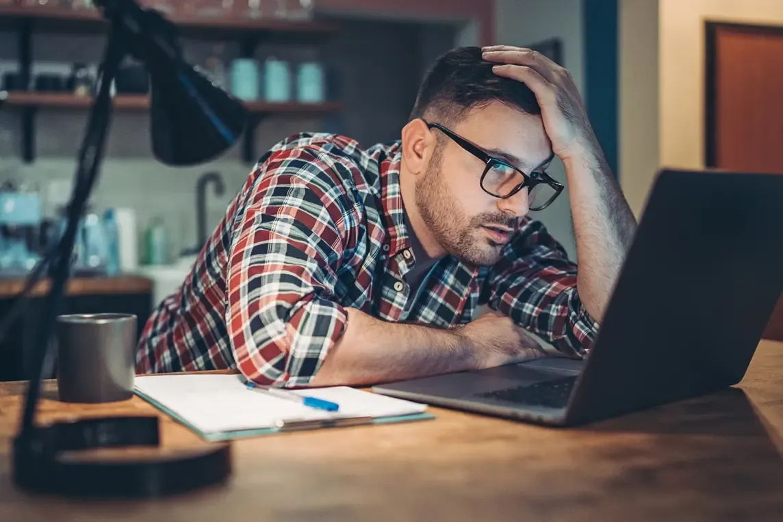 Man frustrated with slow internet