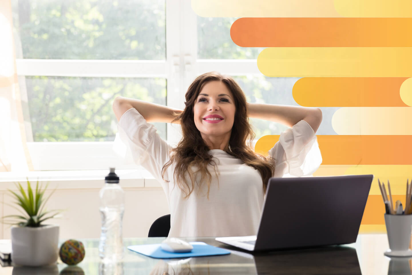 Woman relaxing in her home office chair and enjoying her internet.