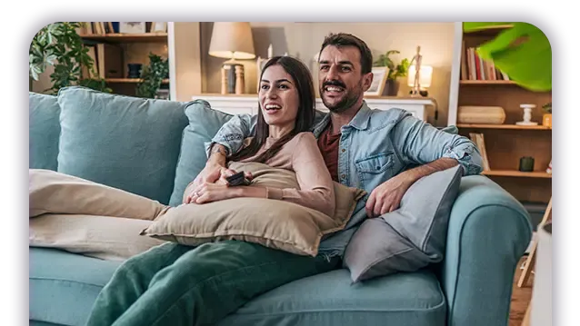 a couple watching tv together