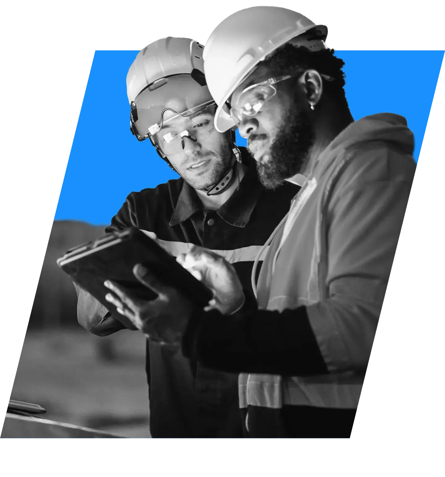 Workers at construction site using a tablet connected to Viasat internet