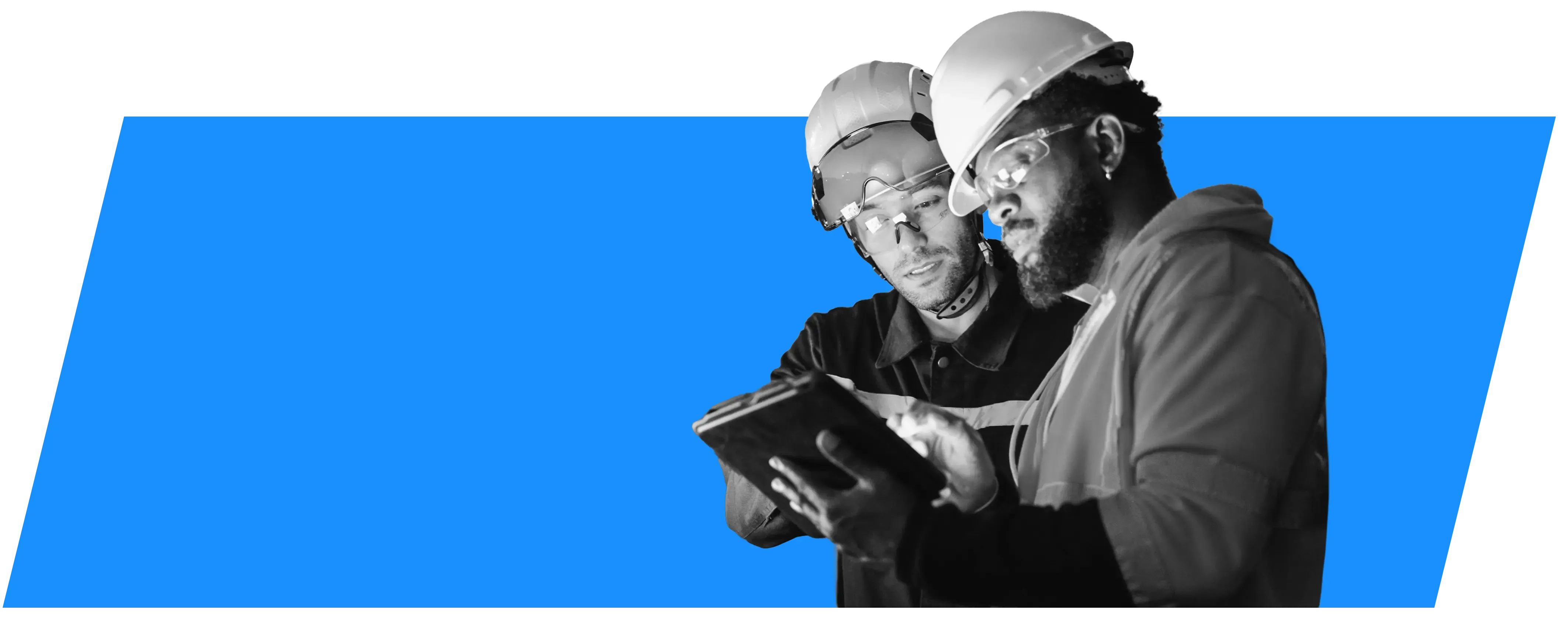 Workers at construction site using a tablet connected to Viasat internet