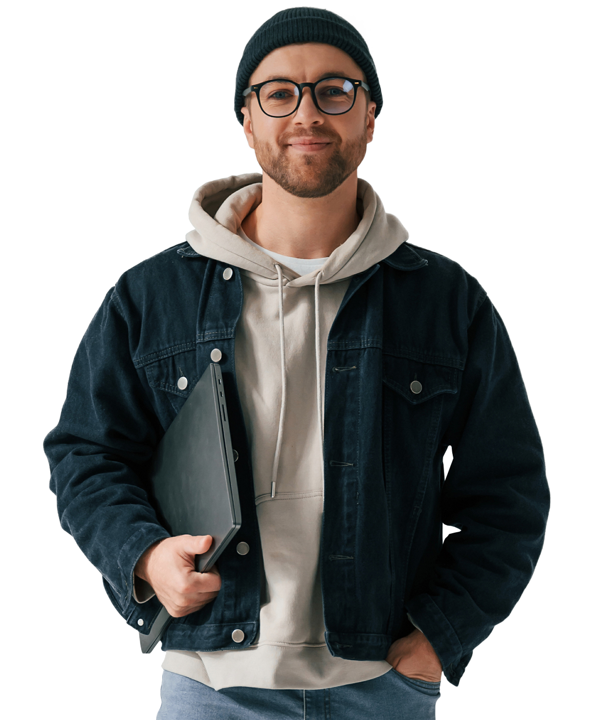 Guy wearing a beanie and holding a laptop under his arm