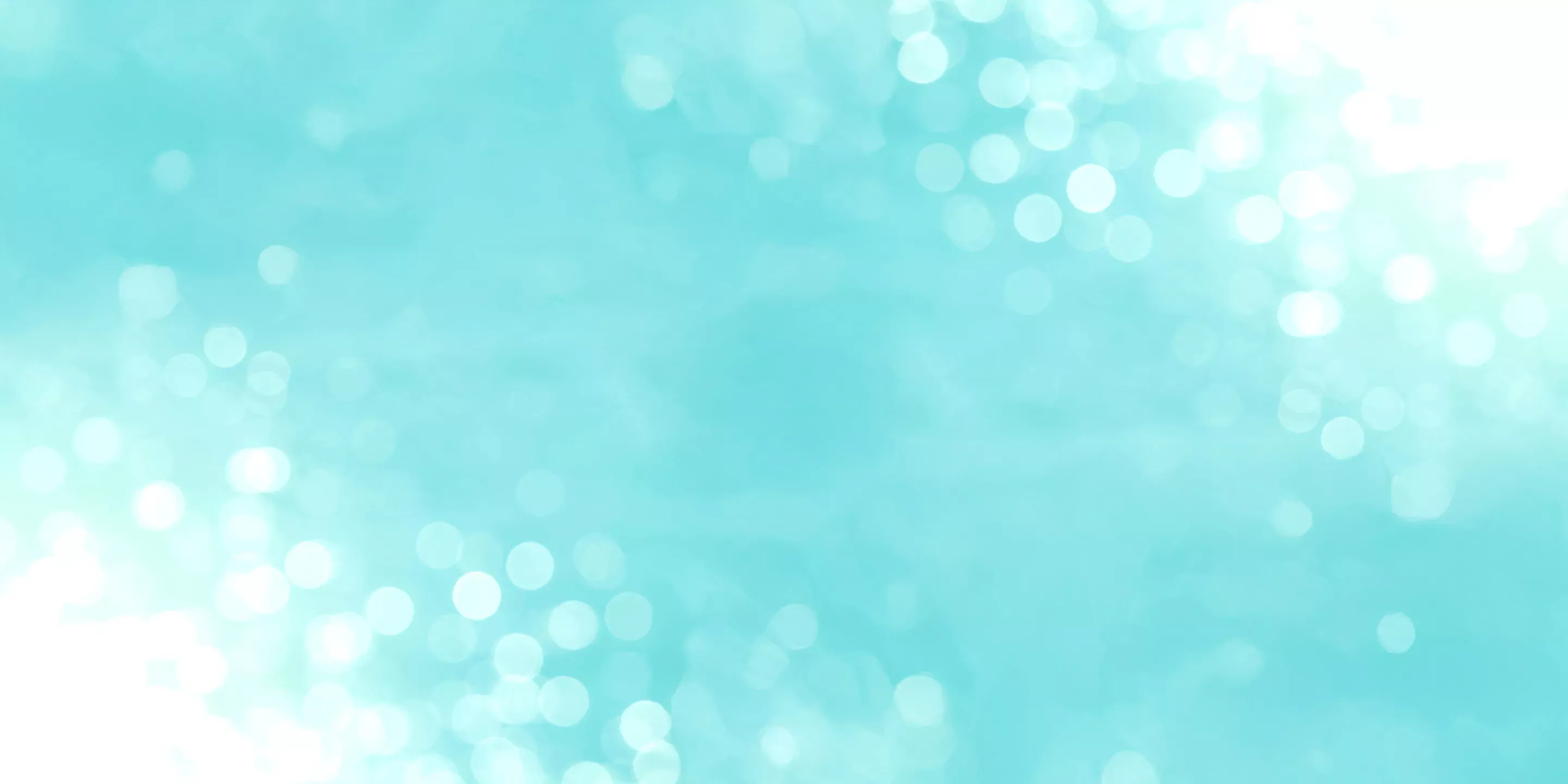 Soft teal background featuring out-of-focus white bokeh light circles concentrated in the corners.