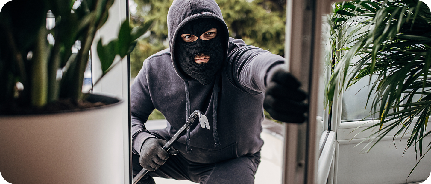 Man breaking into home
