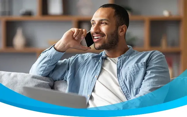 Man using AT&T services in his living room