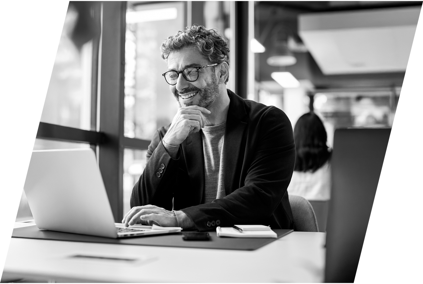man on a video call in a cafe