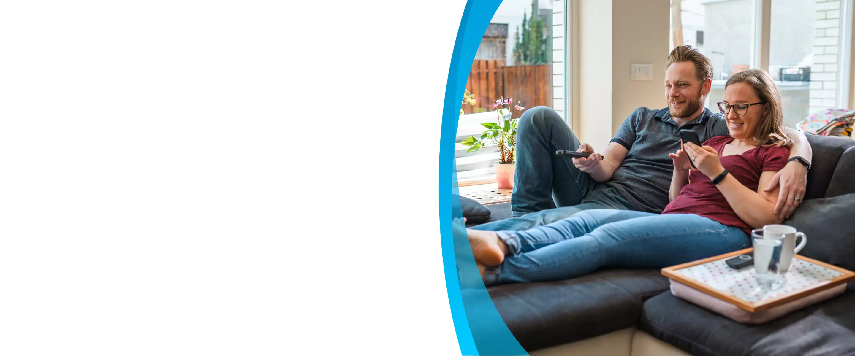 caucasian watching tv on couch