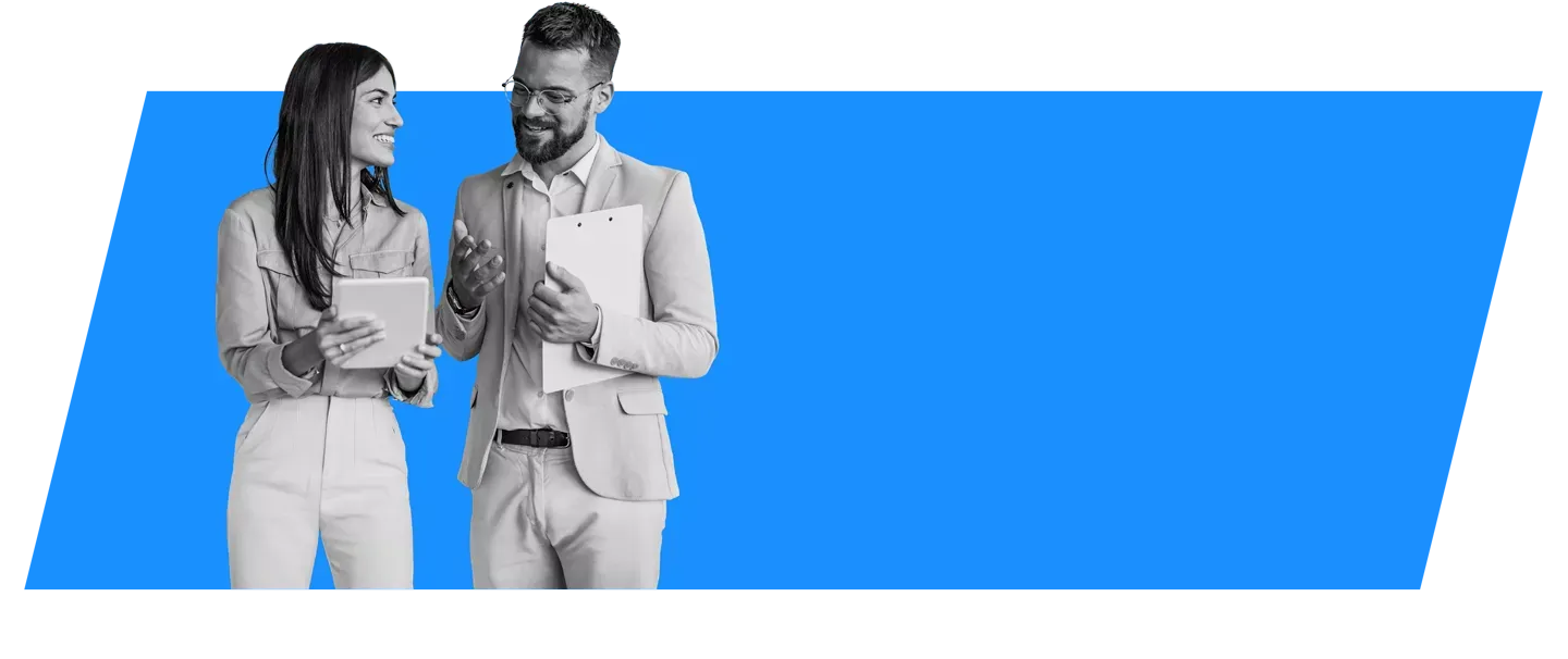 woman and man looking at a tablet