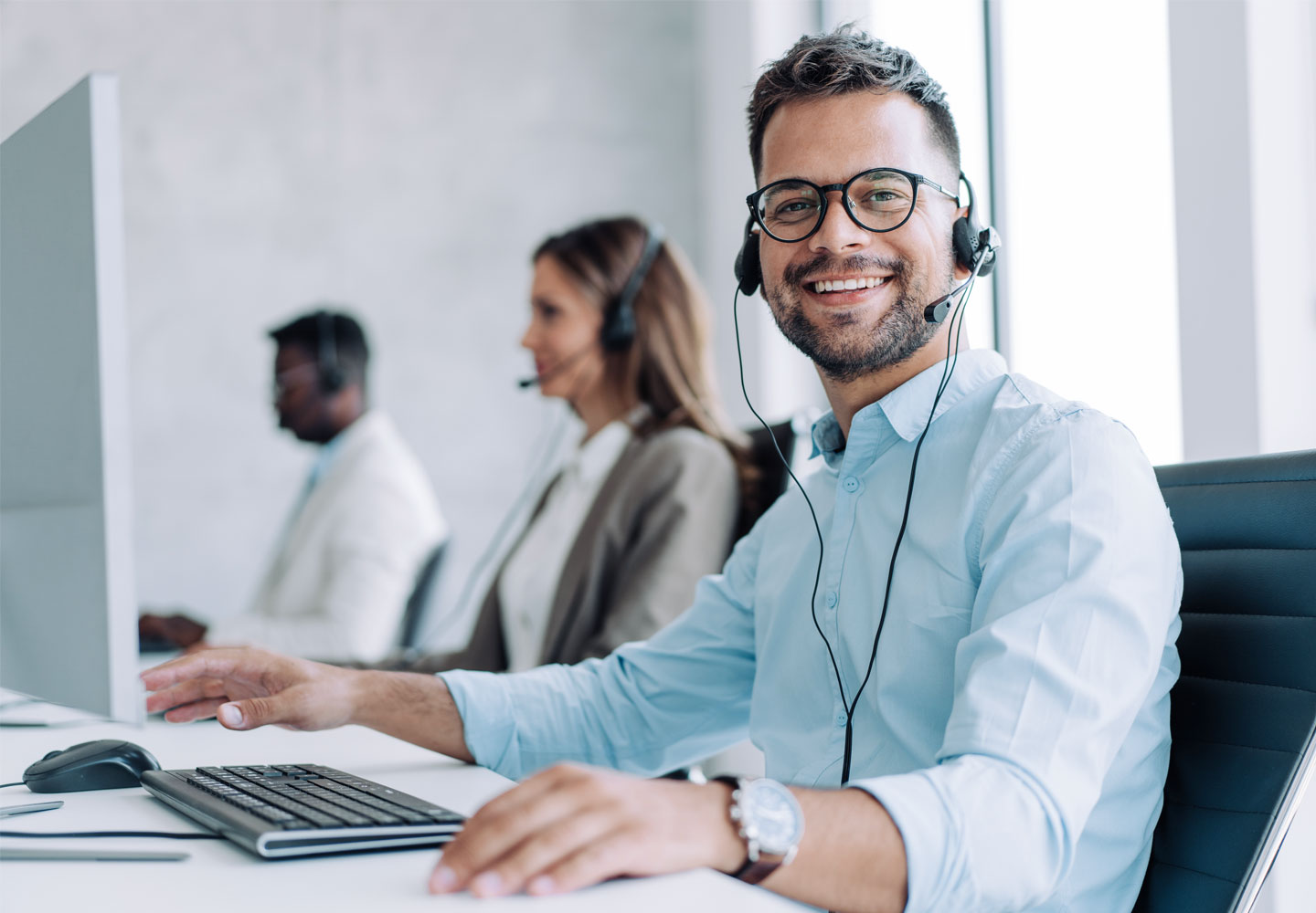 Male customer Service representative smiling