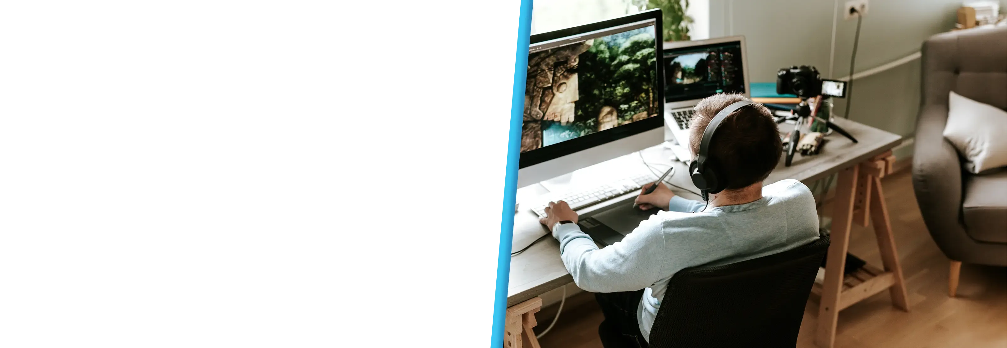 A person wearing headphones uses a graphics tablet at a dual-monitor desk in a home studio.