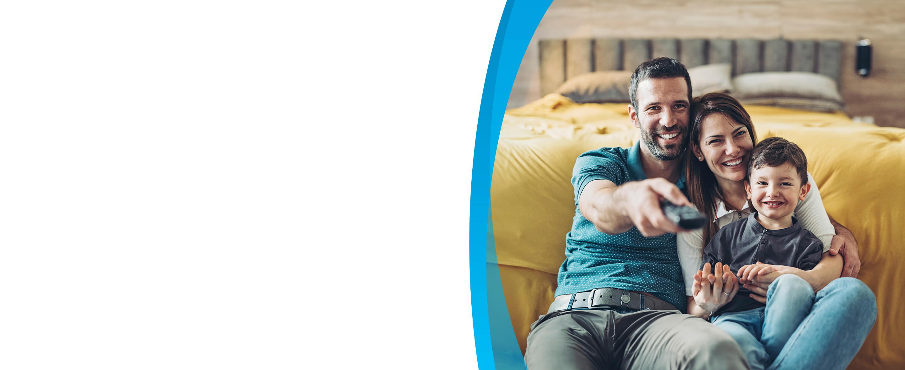 Happy family watches tv together.