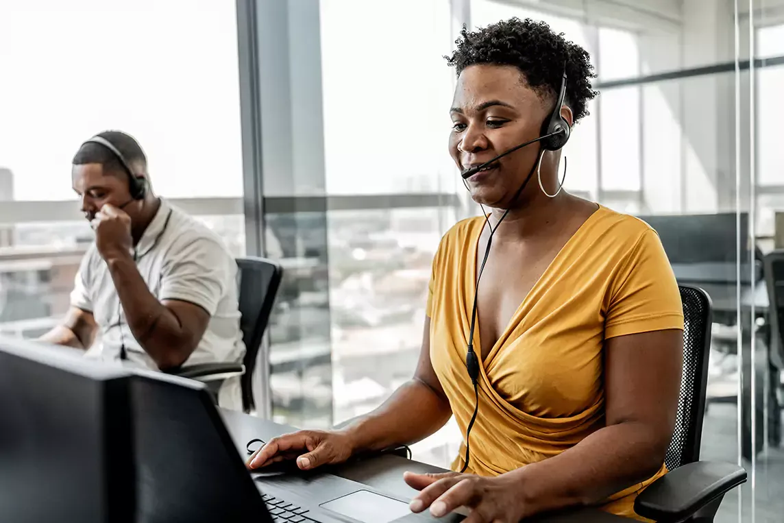 dish customer service agent wearing yellow shirt