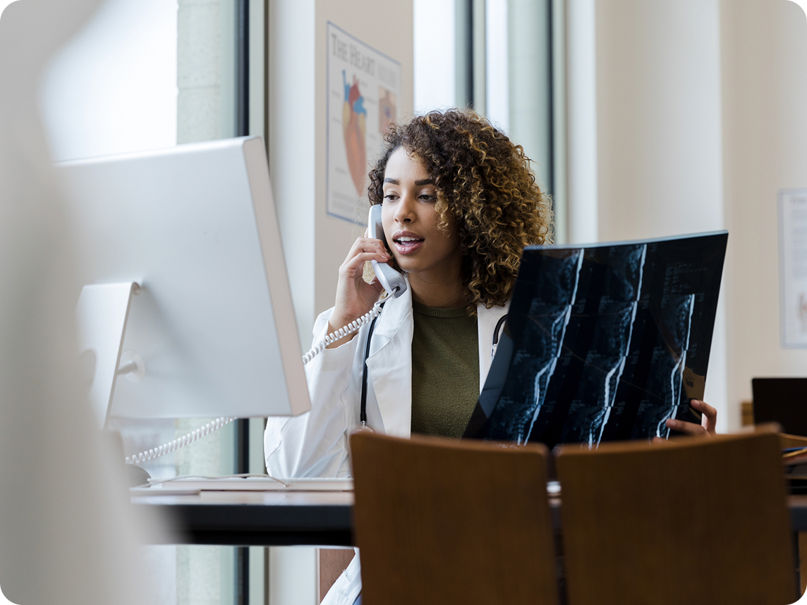 doctor using verizon internet and phone