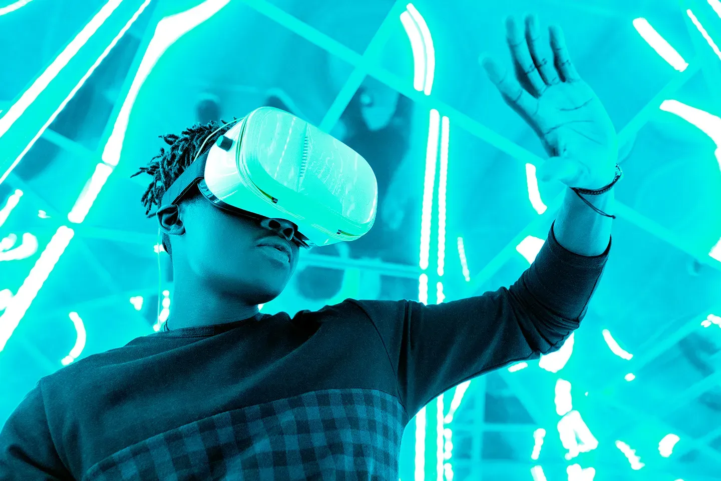 Man in VR goggles engaging in virtual reality gaming