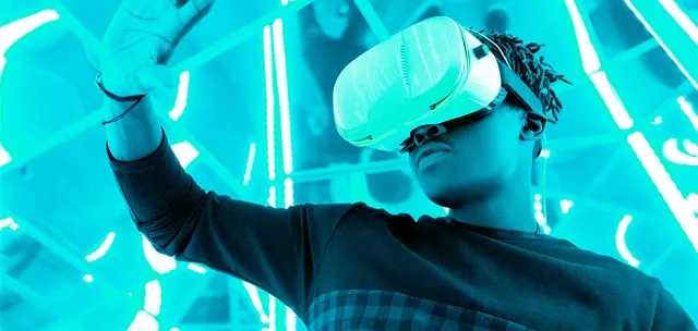 Man in VR goggles engaging in virtual reality gaming