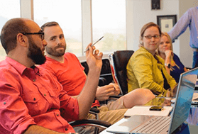 employees at conference table