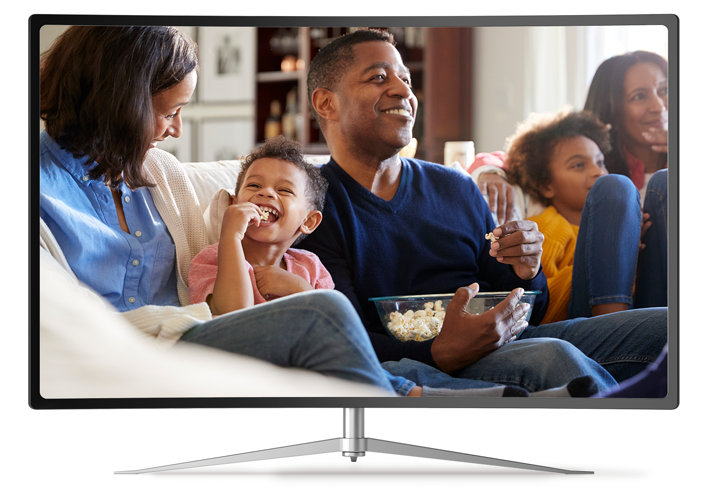 family laughing, watching tv, eating popcorn