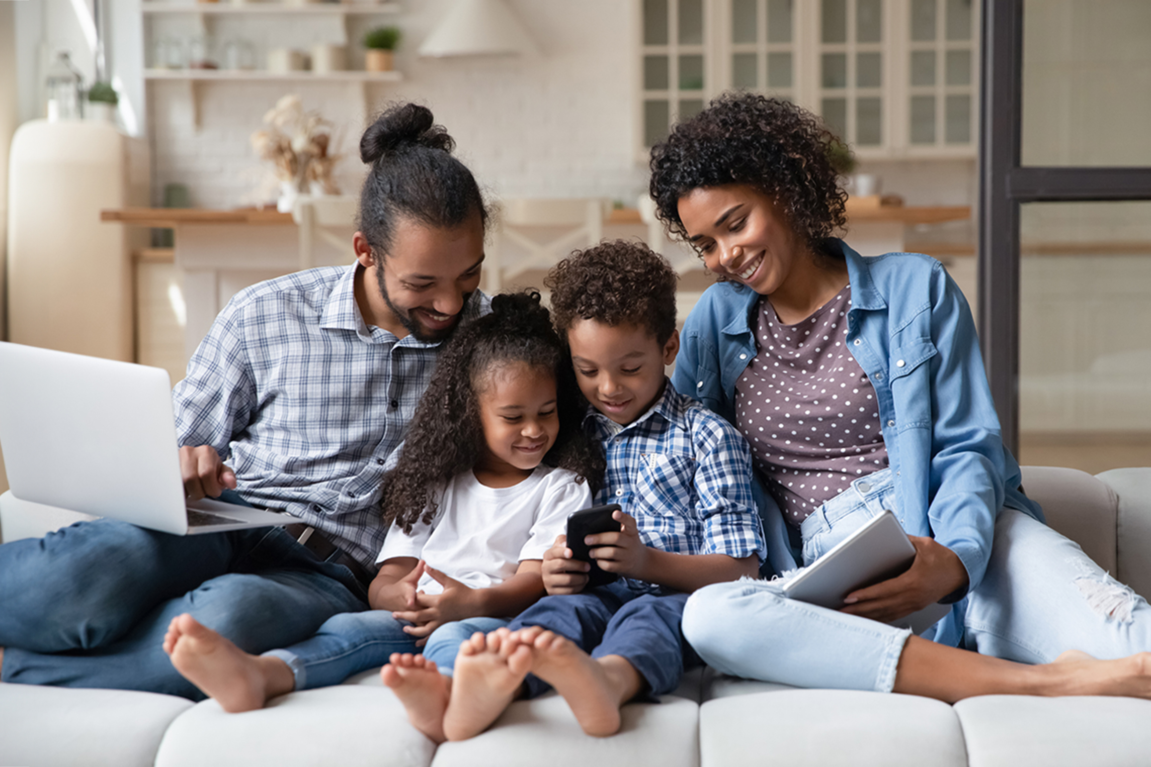 Happy family uses electronic devices with fast internet.