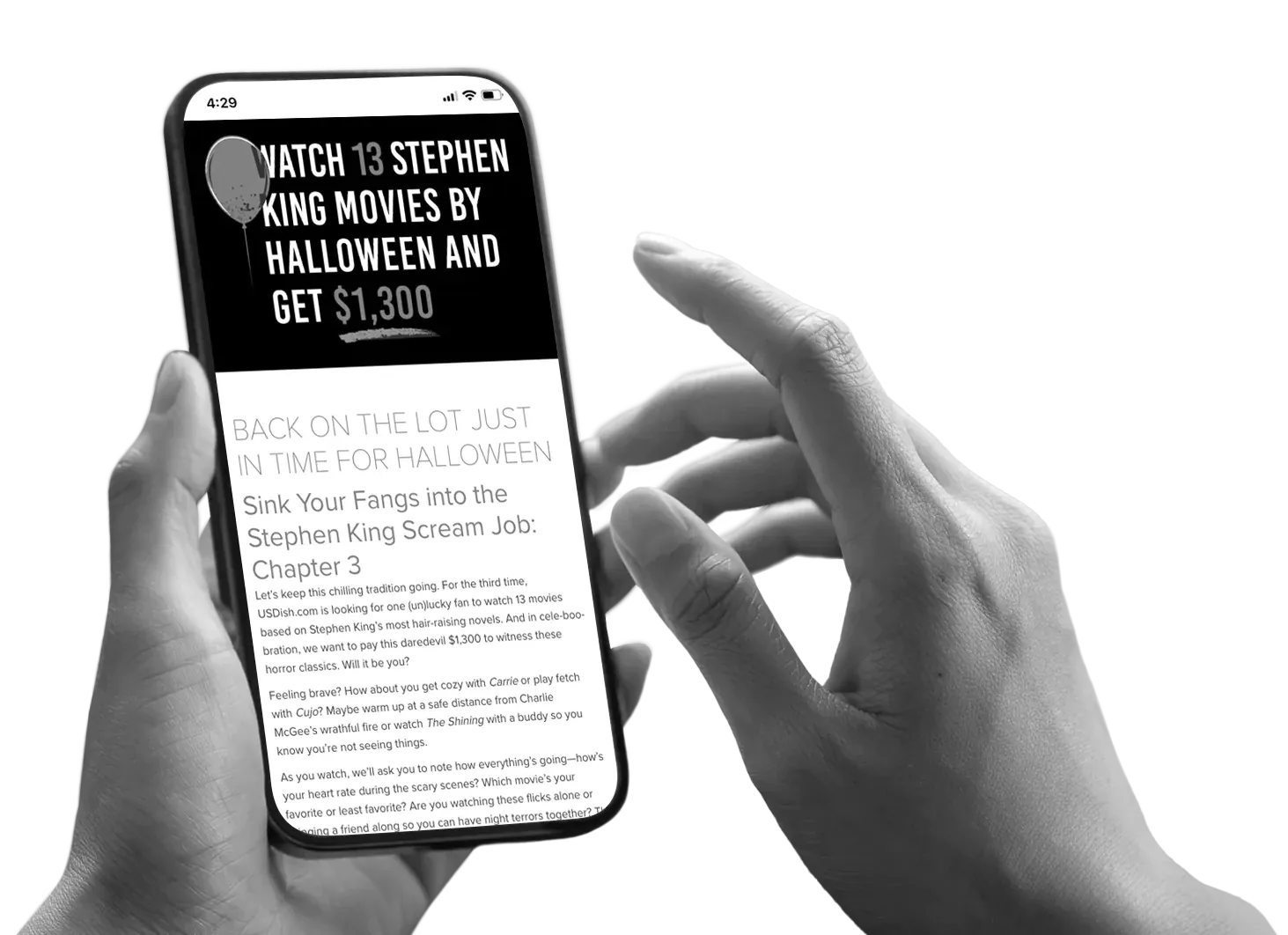 Hands holding a phone showing details of a Halloween dream job promotion