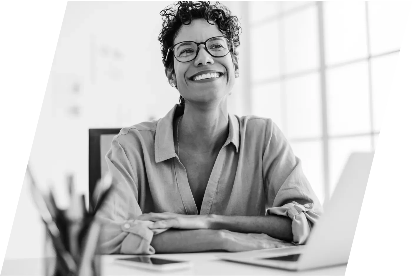 Happy woman at her desk