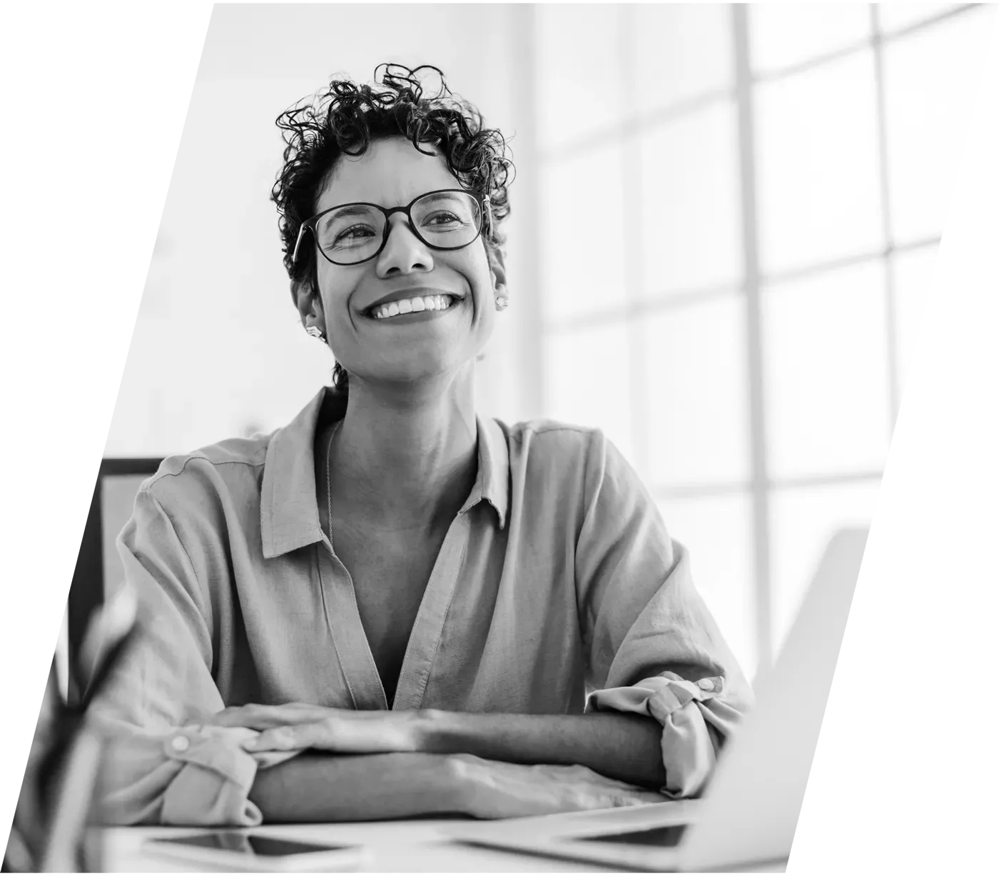 Happy woman at her desk