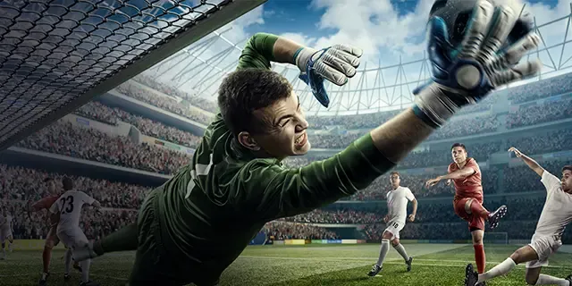Goal keeper blocking shot at full stretch