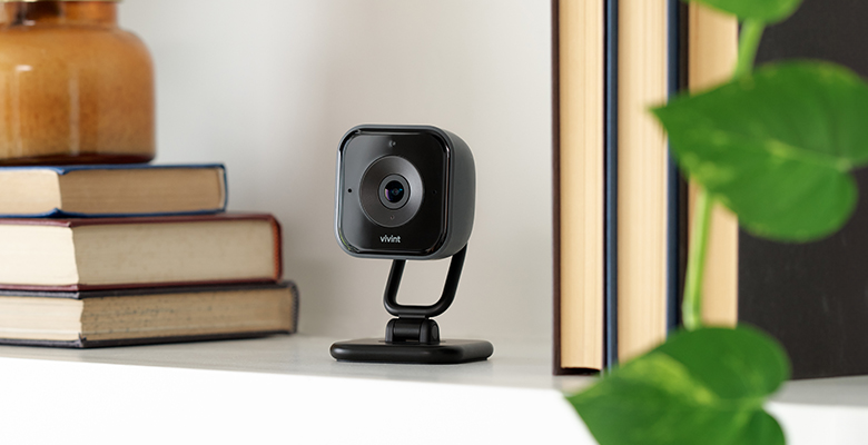 Close up of Indoor Camera Pro on bookshelf.