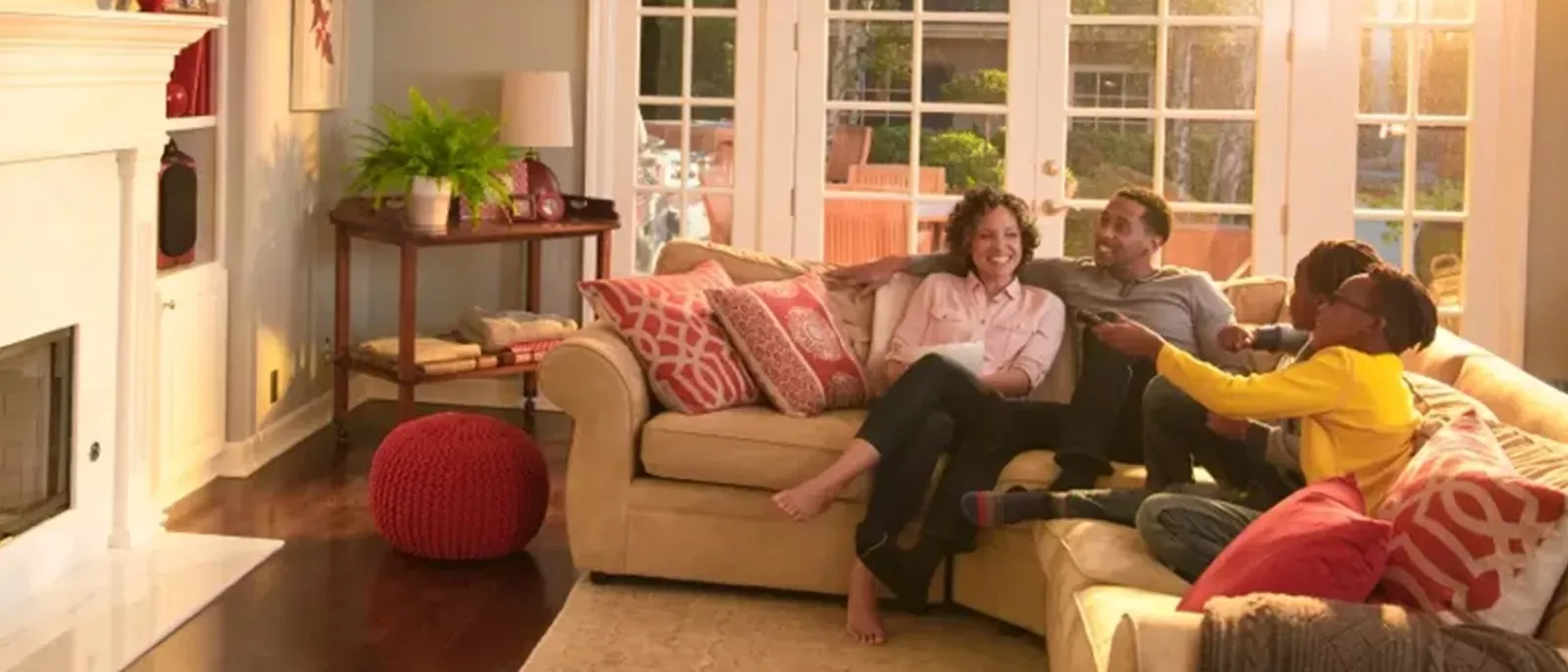 Family uses remote to watch TV