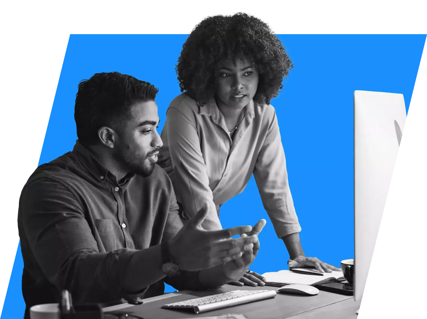 coworkers discuss Internet of Things strategy