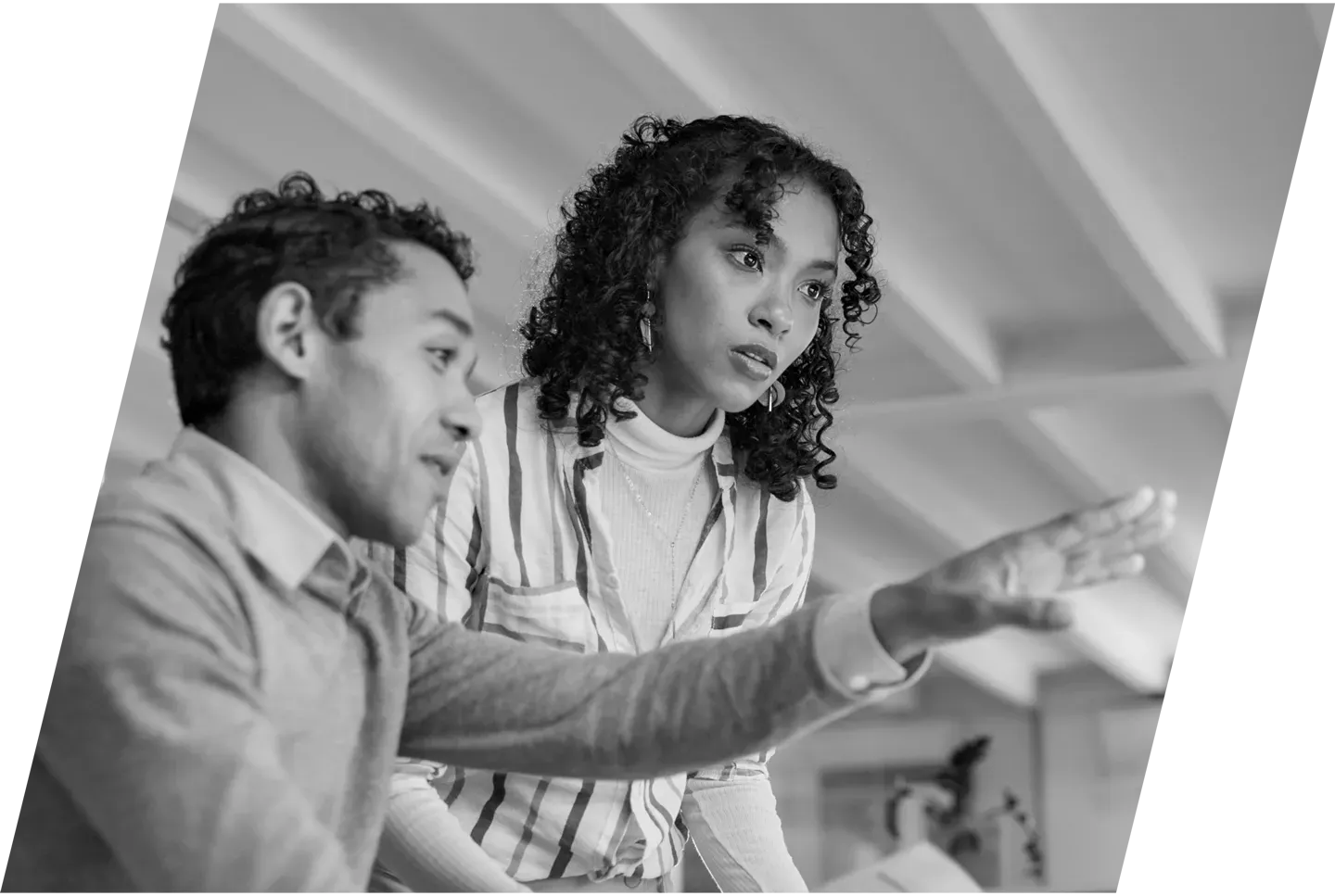 co-workers discuss strategy