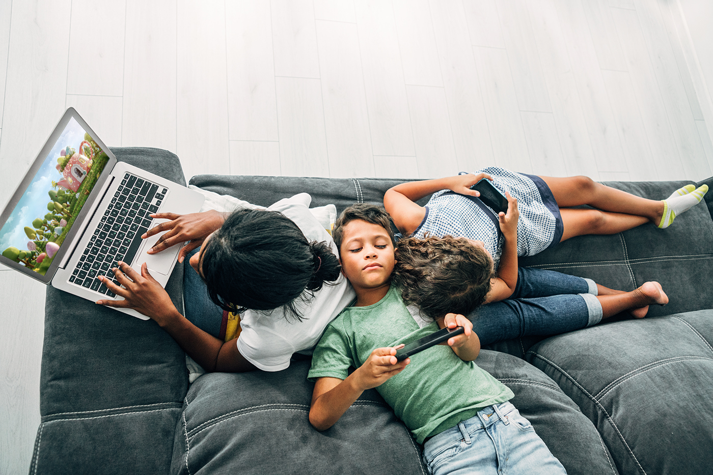 kids watching tv on different devices
