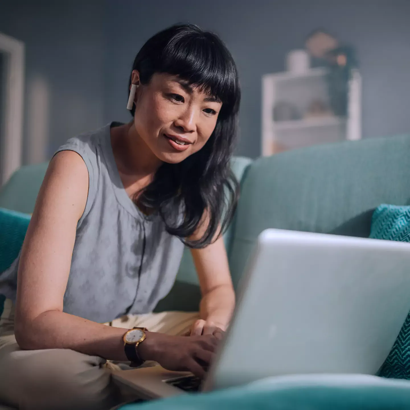 Woman searching the web for solutions on her laptop