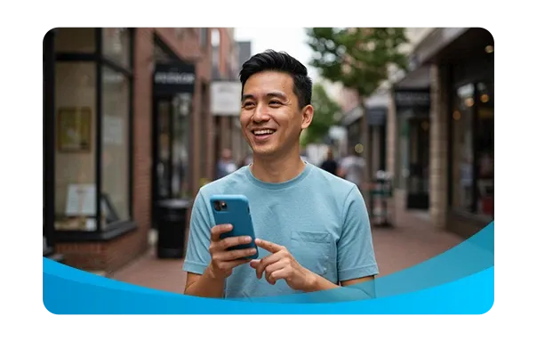 man with cell phone on main street