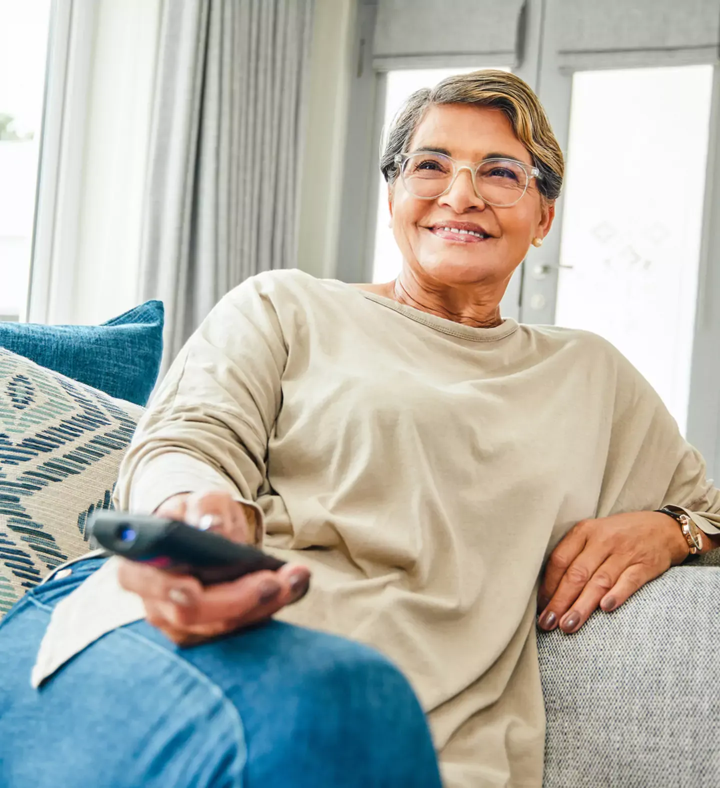 mature latina woman watching Dish TV