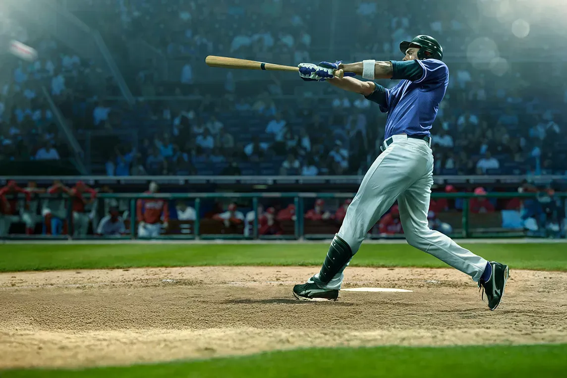 MLB batter hitting baseball