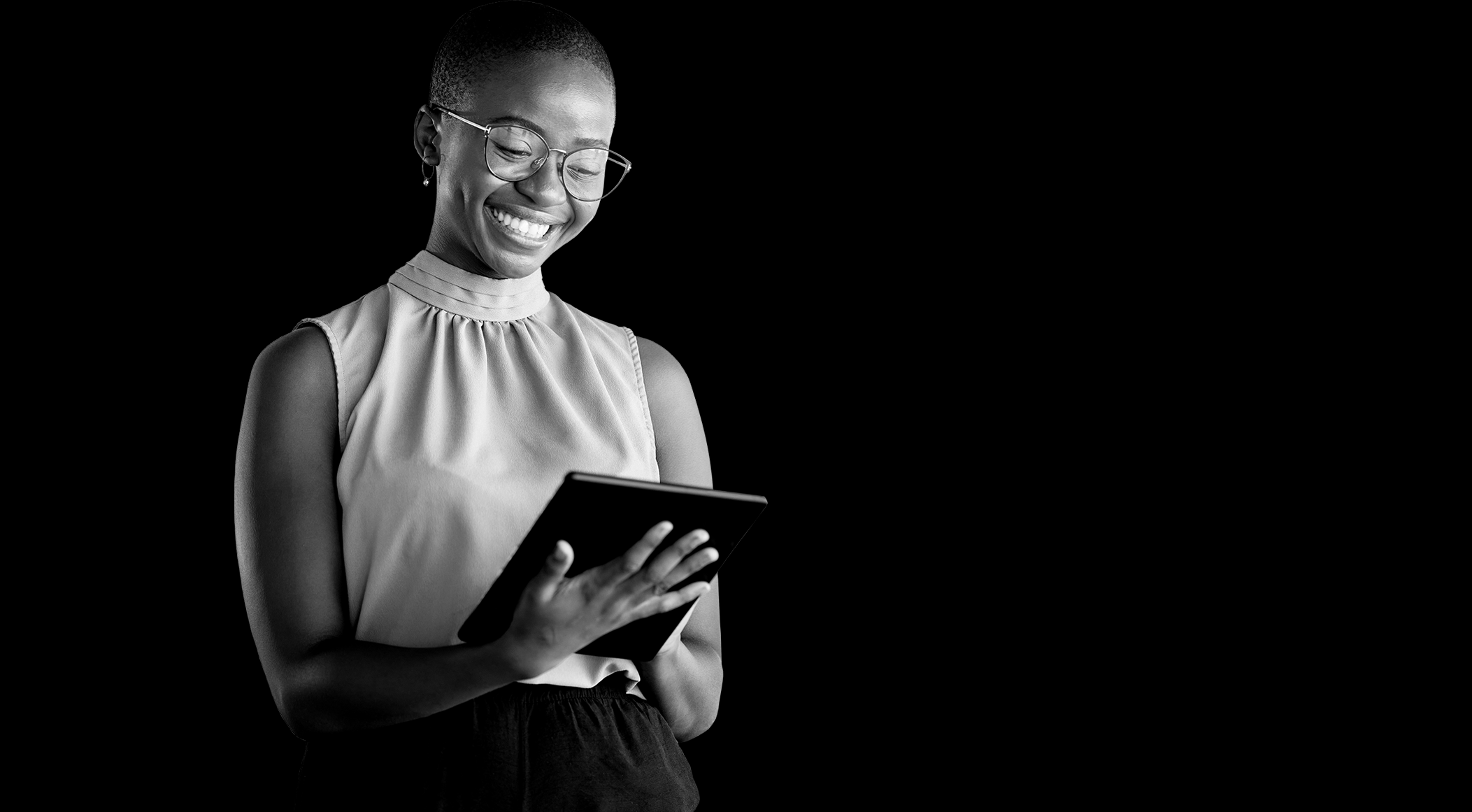 Businesswoman on tablet smiling