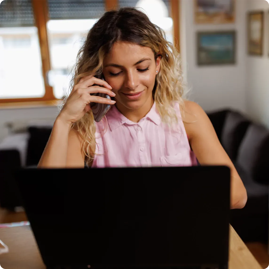 Using phone and laptop together.