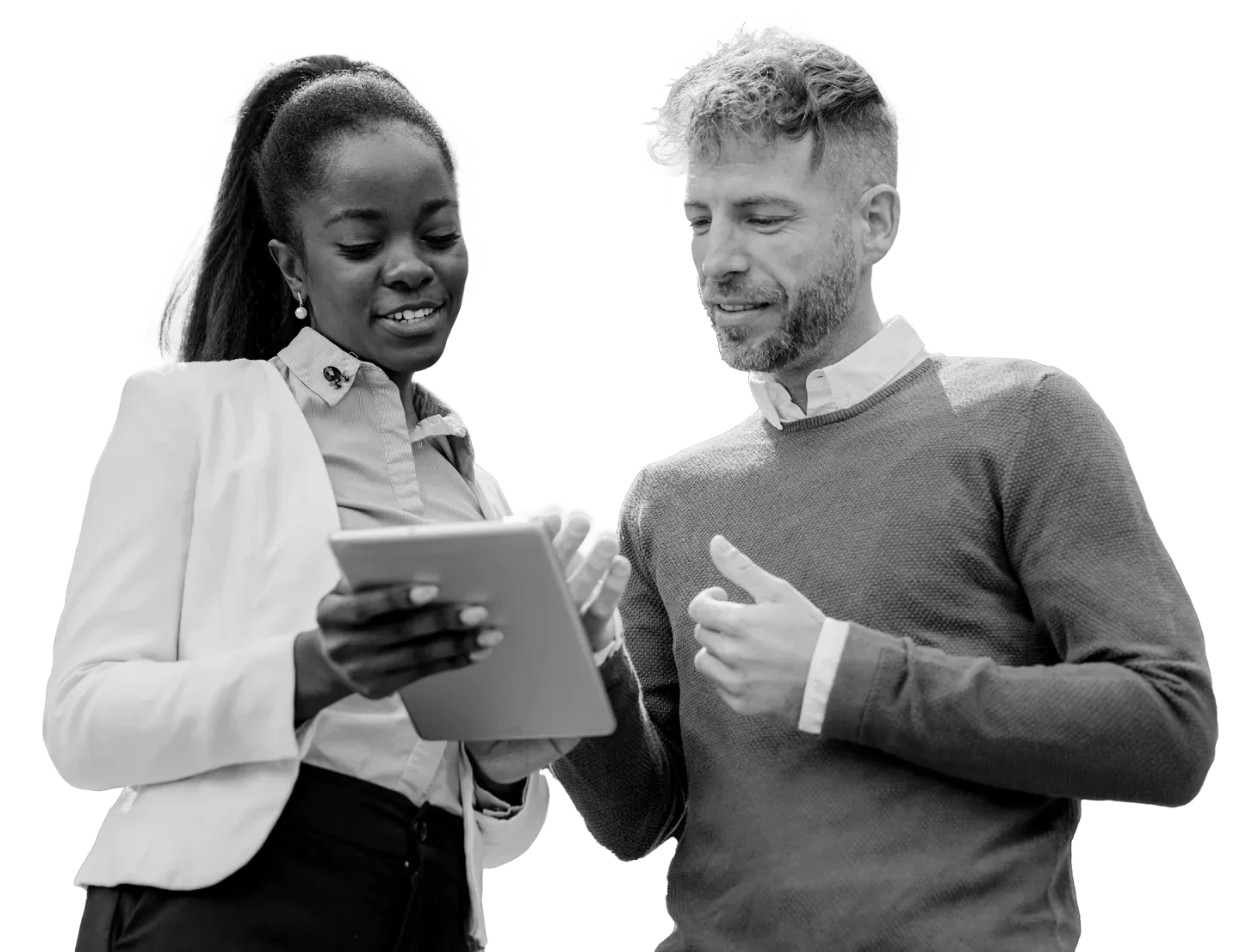 woman and man looking at a computer tablet together