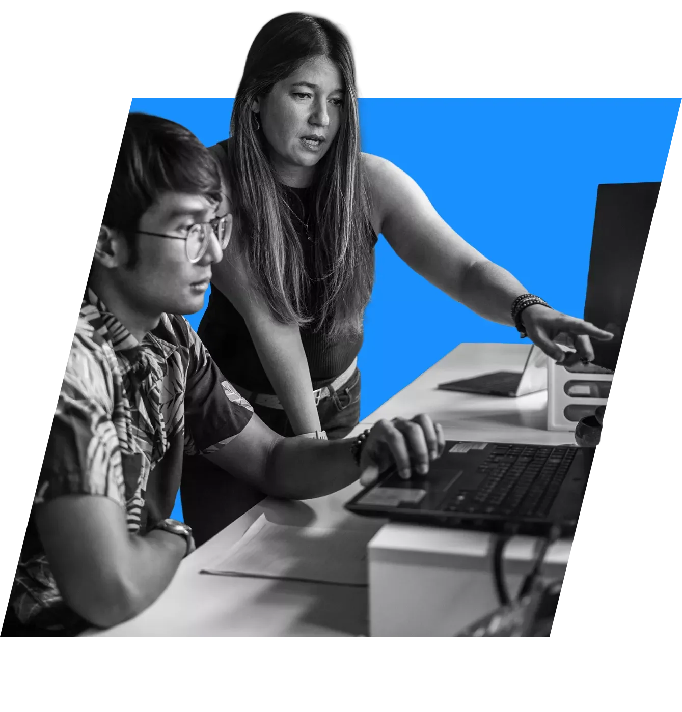 co-workers looking at a computer screen together