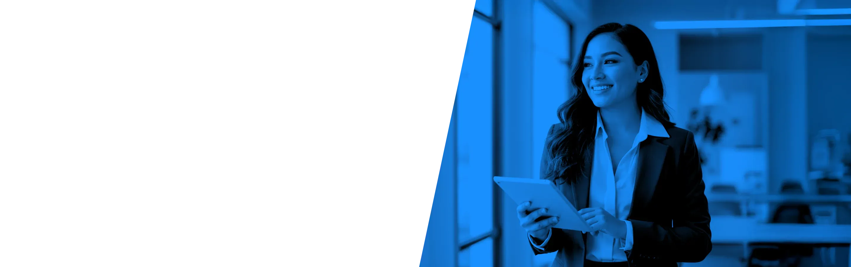 Smiling business woman using her tablet.