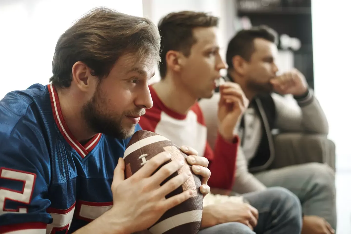 Watching football with friends.