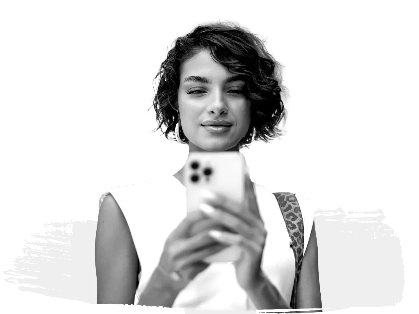 Stylish young woman using her smartphone