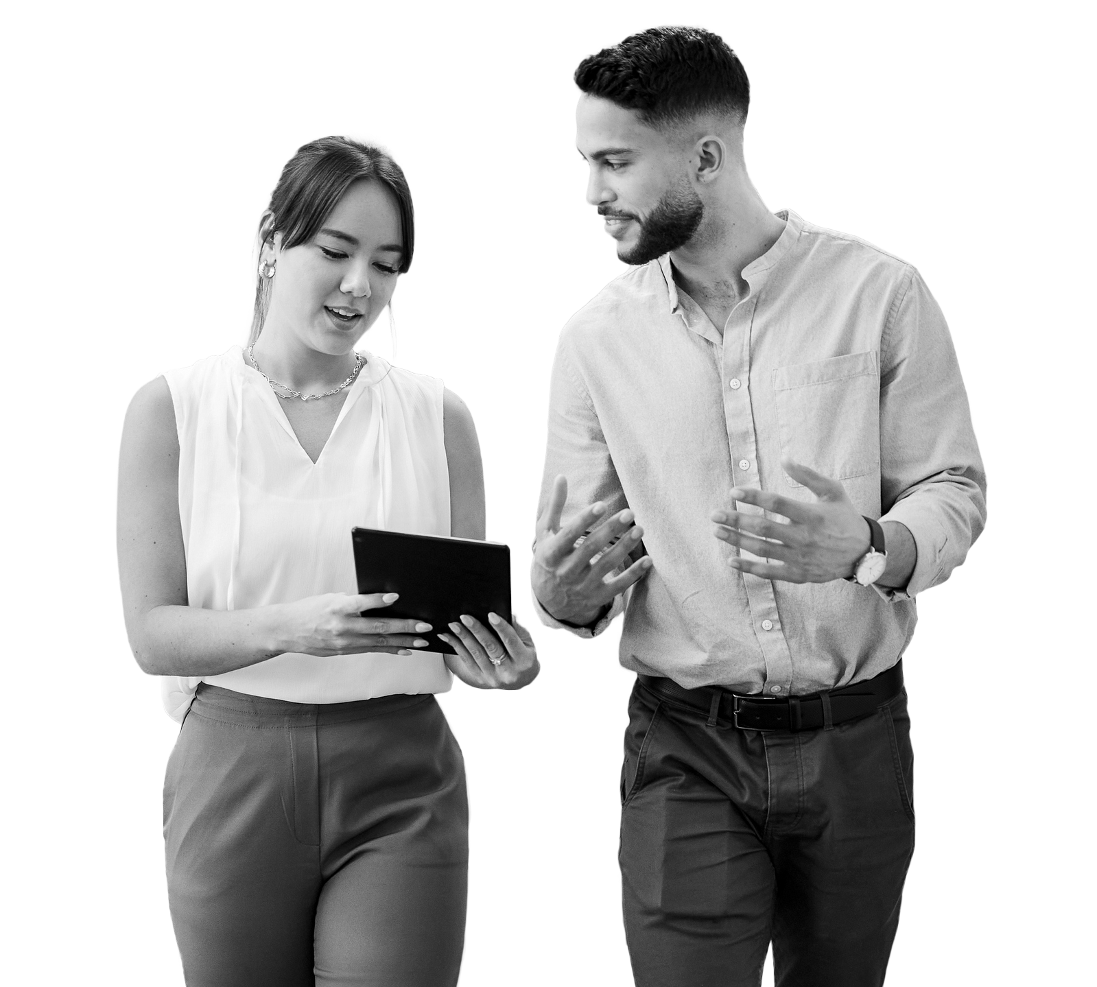 business woman and man talking and walking with a tablet