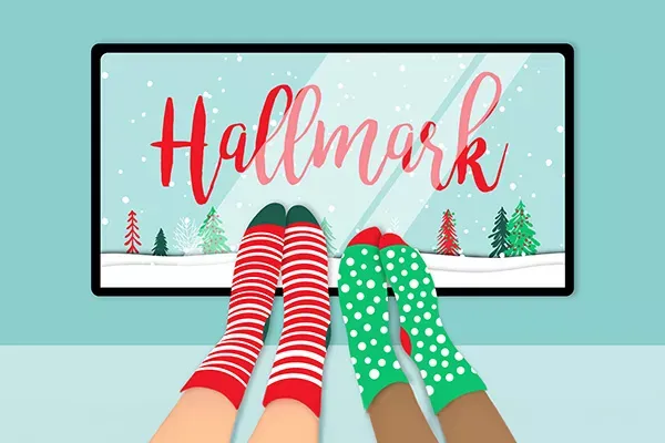 Illustration of two christmas themed cozy socked feet watching Hallmark movies on their TV.