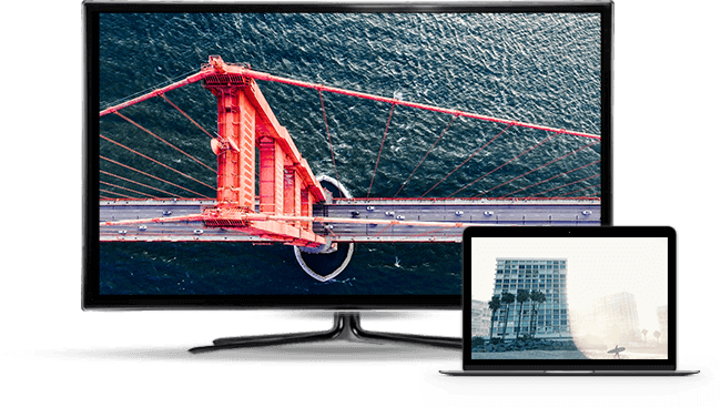 tv and laptop with image of bridge